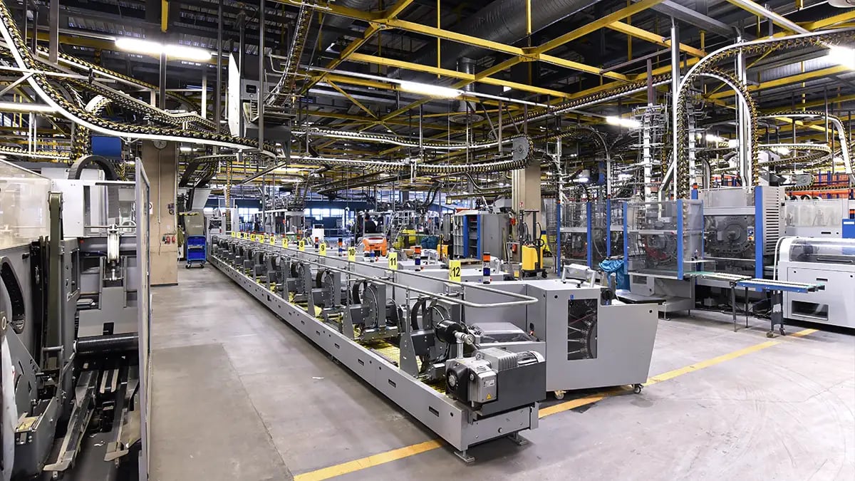 Industrial IoT manufacturing line with automated machinery used in edge computing applications.