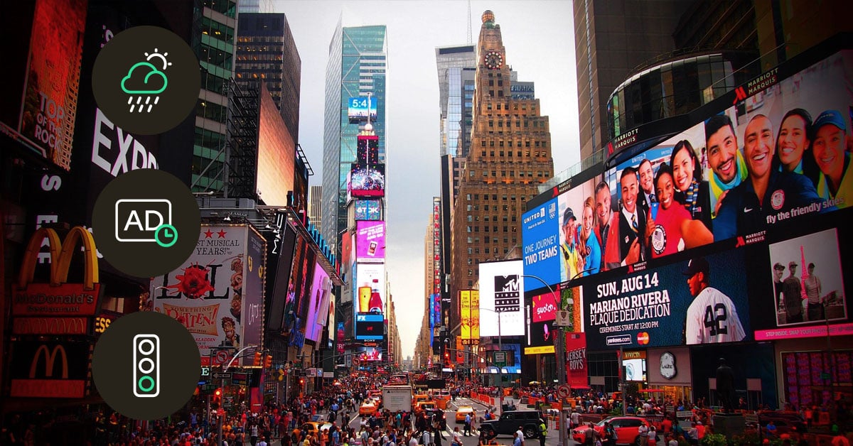 Billboard powered by IoT connectivity from Com4, displaying a digital advertisement connected through smart technology.