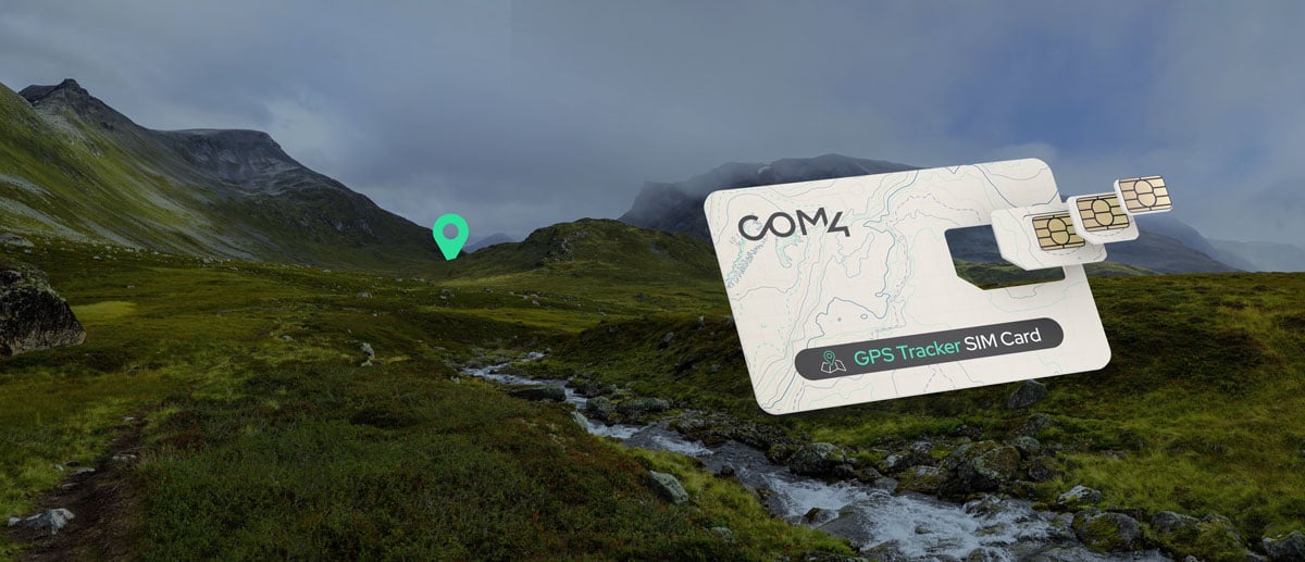 Com4 IoT SIM card for GPS tracking devices with blue tint background