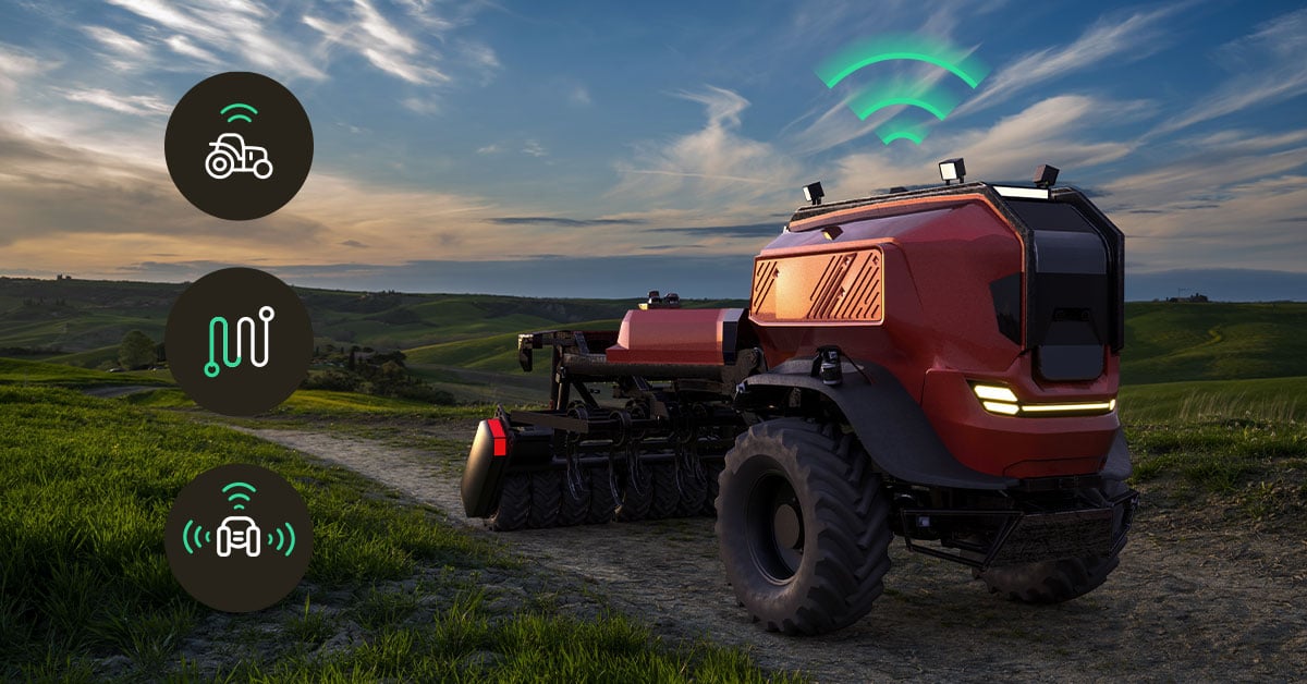 Truck equipped with IoT sensors using Com4 connectivity for real-time monitoring of agricultural operations, enabling data-driven farming and efficient logistics.