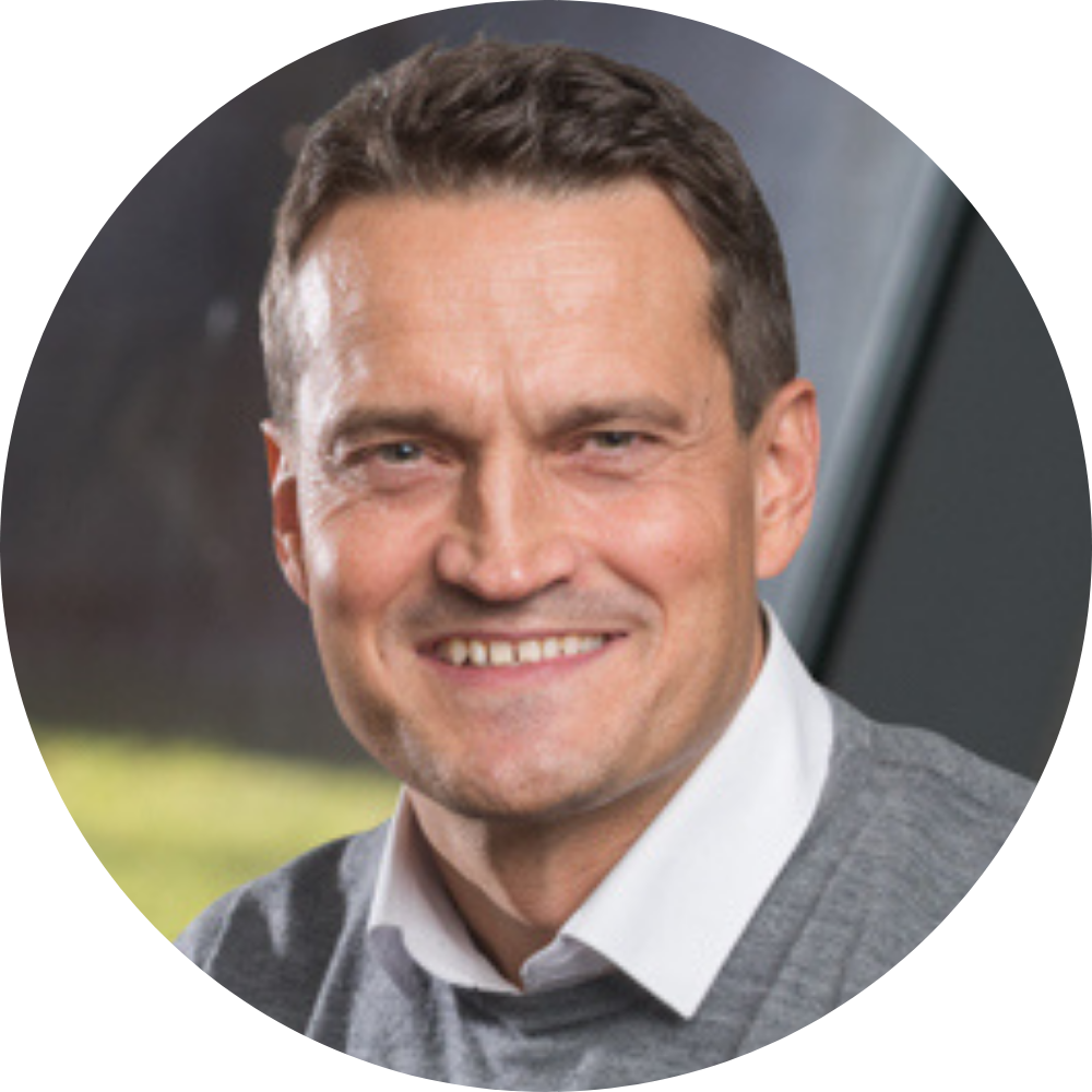 Ole Ivar Berg professional headshot at Com4