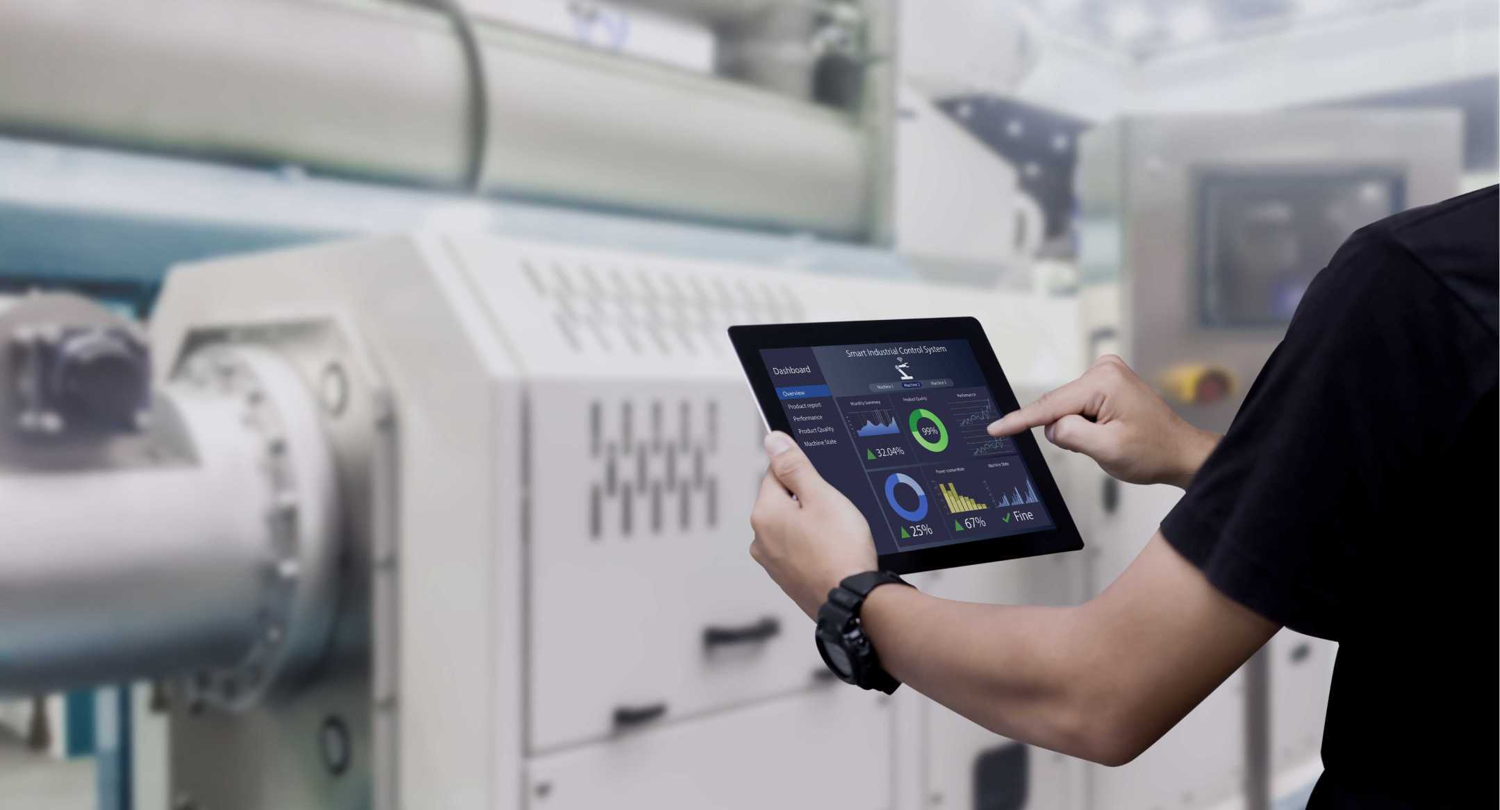 Tablet graphs infront of machine