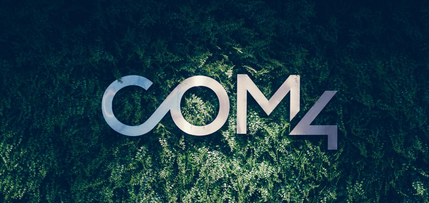 Com4 wall logo