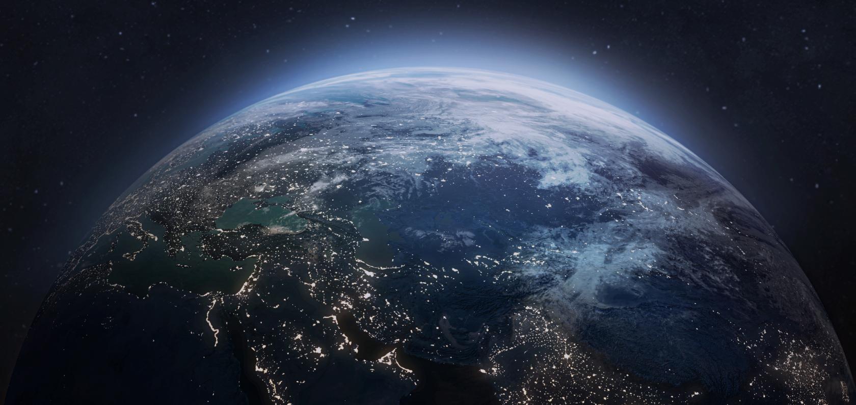 Earth from space with visible network connections representing global IoT connectivity