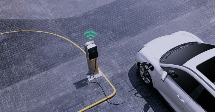 Electric car charging at a connected smart EV station