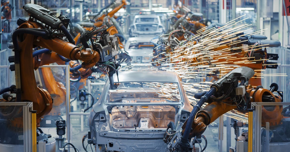 Robots with IoT connectivity powering smart car manufacturing, enabling real-time monitoring, automation, and efficient industrial production.