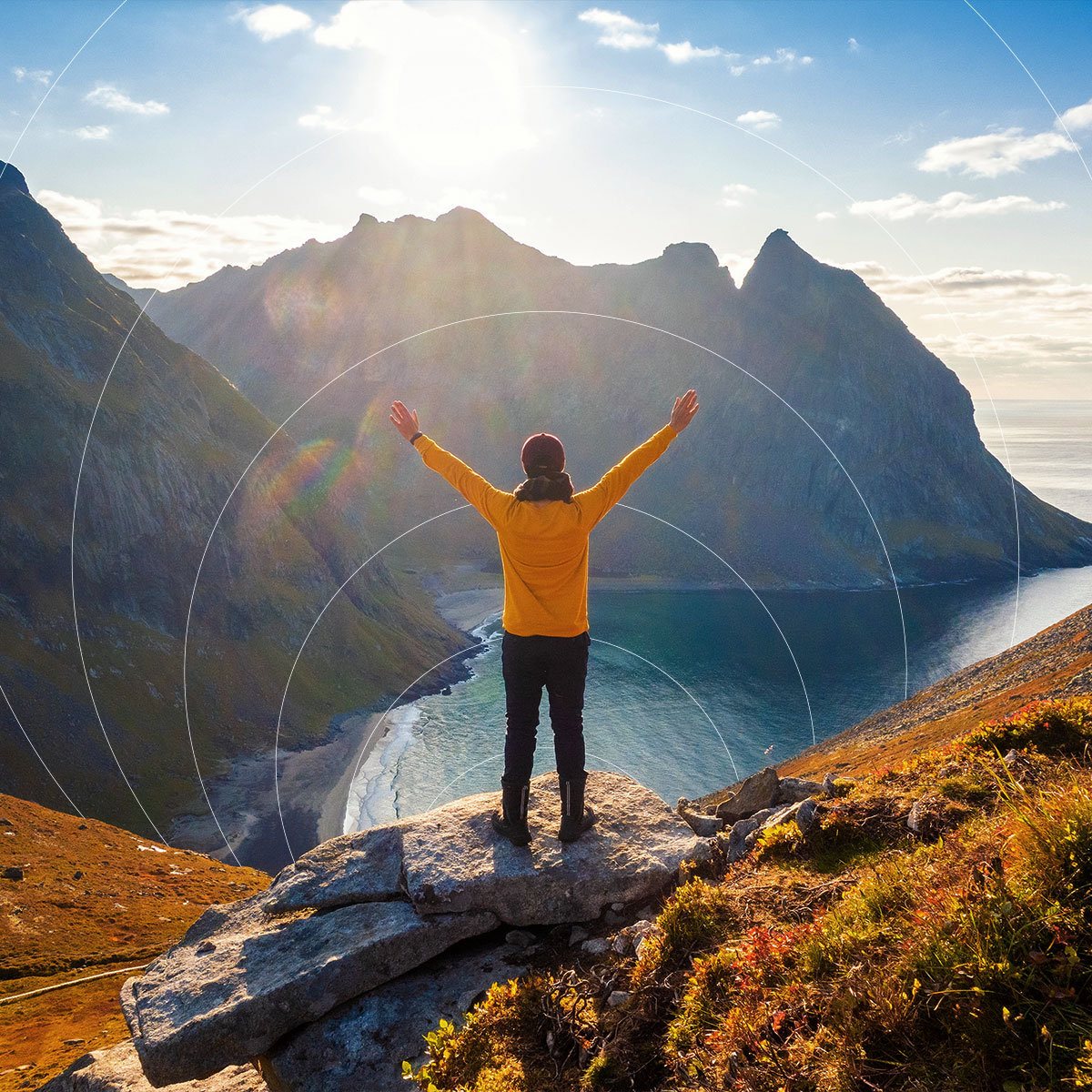 Engineer standing on a mountain peak celebrating best IoT connectivity provider 2026 with excellent global connectivity